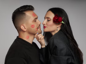 image-couple-love-kissing-lipstick-marks-their-face-kiss-rose-flowers-love-hugs-man-woman-husband-wife_91497-11593