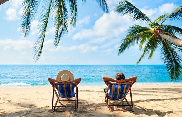 image-couple-relax-on-the-beach-enjoy-beautiful-sea-on-the-tropical-island